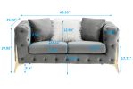 Two-seater grey velvet sofa