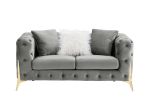 Two-seater grey velvet sofa